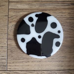 Epoxy resin coaster cowhide print.